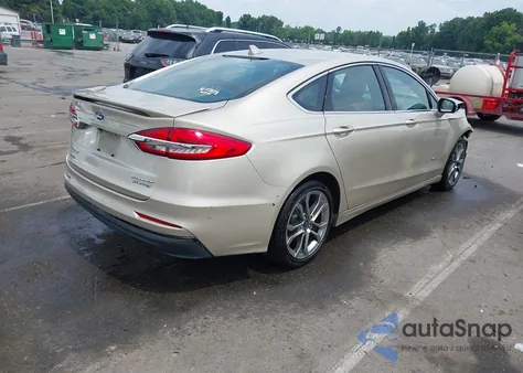 2019 Ford Fusion Hybrid Titanium from USA, damaged, VIN 3FA6P0RU6KR141336